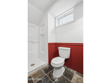 This beautifully maintained home sits on a 1-acre wooded - photo 44