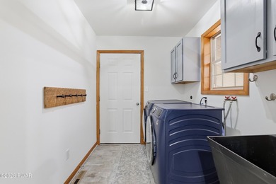 This beautifully maintained home sits on a 1-acre wooded - photo 45
