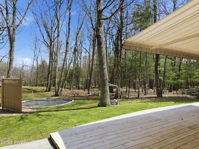 This beautifully maintained home sits on a 1-acre wooded - photo 49