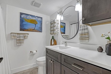 Welcome to this beautifully updated, light-filled corner unit - photo 11