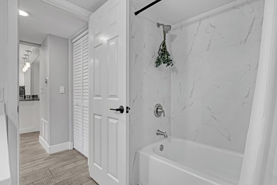 Welcome to this beautifully updated, light-filled corner unit - photo 12