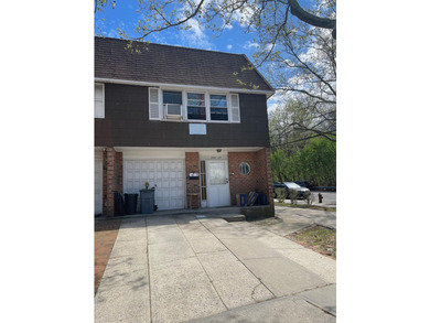 Welcome to this Semi Attached two-family home located on the - photo 1