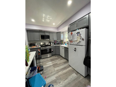Welcome to this Semi Attached two-family home located on the - photo 6