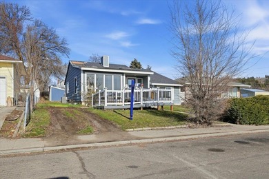 This beautiful home is ideally located just blocks away from