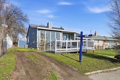 This beautiful home is ideally located just blocks away from