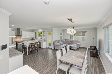 Easily mistaken for a Kahala home! This exceptional example of - photo 4