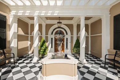 This spectacular home overlooking Colonial Lake was designed by - photo 5