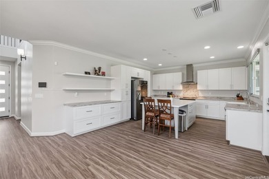 Easily mistaken for a Kahala home! This exceptional example of - photo 5