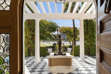 This spectacular home overlooking Colonial Lake was designed by - photo 6