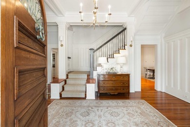 This spectacular home overlooking Colonial Lake was designed by - photo 7
