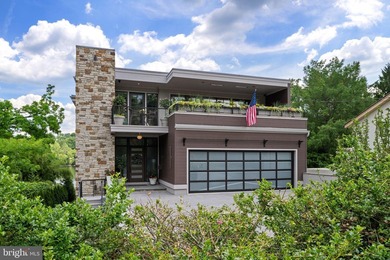 Modern Riverfront Estate with Unparalleled Indoor-Outdoor Living - photo 1
