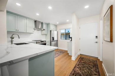 Impeccably remodeled top-floor condominium in a fantastic