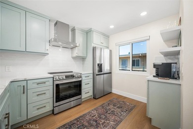 Impeccably remodeled top-floor condominium in a fantastic