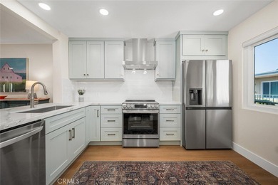 Impeccably remodeled top-floor condominium in a fantastic