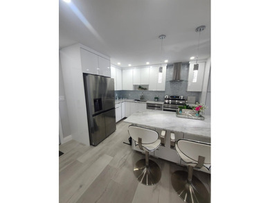 Don't miss this rare 2-bedroom gem with its own private balcony - photo 11