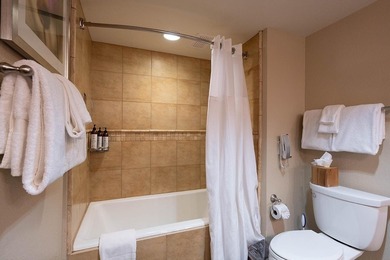 The stunning 3 bedroom corner unit is located at the end of the - photo 11