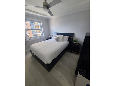 Don't miss this rare 2-bedroom gem with its own private balcony - photo 12