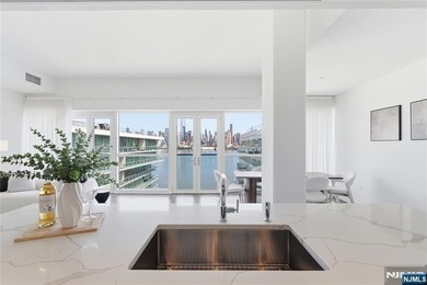 Enjoy waterfront living at its finest in Residence #1010 at - photo 15