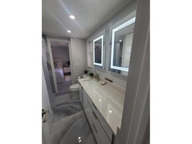 Don't miss this rare 2-bedroom gem with its own private balcony - photo 16
