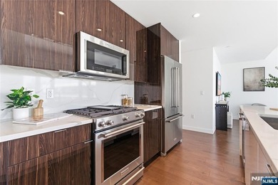 Enjoy waterfront living at its finest in Residence #1010 at - photo 17