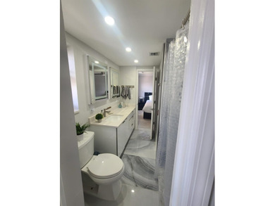 Don't miss this rare 2-bedroom gem with its own private balcony - photo 17