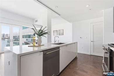 Enjoy waterfront living at its finest in Residence #1010 at - photo 19