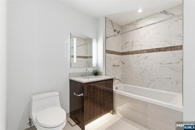 Enjoy waterfront living at its finest in Residence #1010 at - photo 33