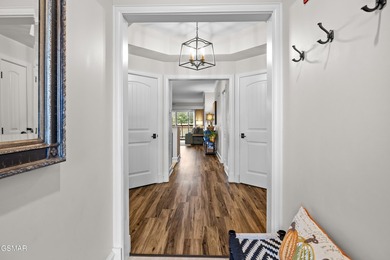 This 3 Bedroom/2 Bath Riverstone Unit has been recently - photo 4