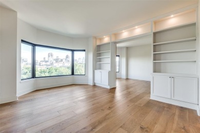 Rarely available and highly sought-after  one of only 12 units