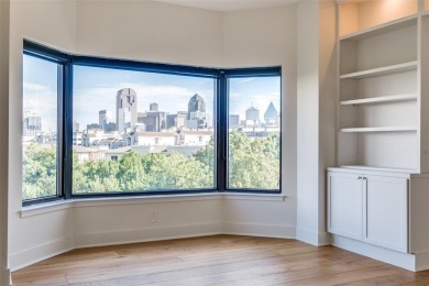 Rarely available and highly sought-after  one of only 12 units