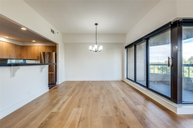 Rarely available and highly sought-after  one of only 12 units