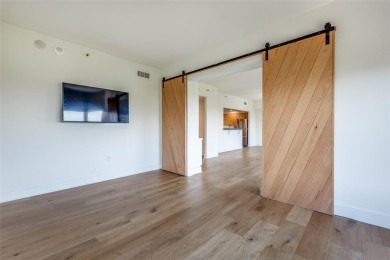 Rarely available and highly sought-after  one of only 12 units