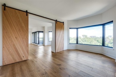 Rarely available and highly sought-after  one of only 12 units