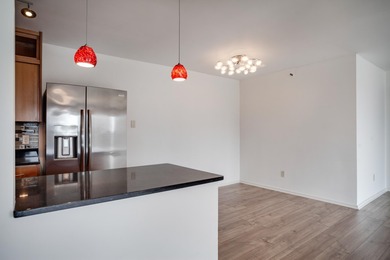 Experience the best of urban living in this sun-filled two