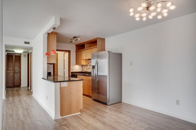 Experience the best of urban living in this sun-filled two