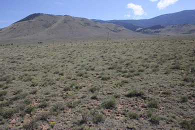 10 acres of 360 degree mountain filled views. Build your - photo 4