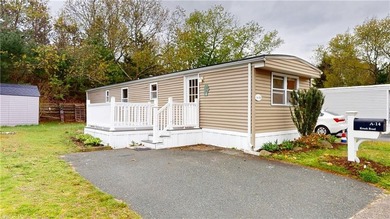 Welcome to easy, low-maintenance living in this well-kept 1985 - photo 1