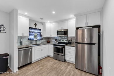 Welcome to this warm and inviting 2-bedroom, 1-bath home in the - photo 12