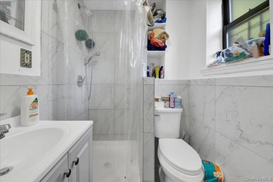 Well-maintained Bronx home offering spacious living, generous - photo 9