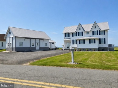 Enjoy waterfront living in this updated 4 bedroom, 2 bath - photo 3