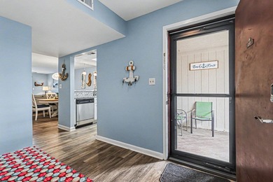 Escape to the beach and unwind in this beautifully remodeled - photo 3