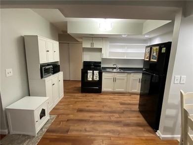 Welcome to Narragansett Village! This first-level condo features - photo 10