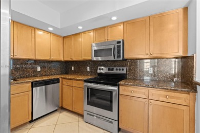 Enjoy Miami Beach living in this move-in ready two-bedroom