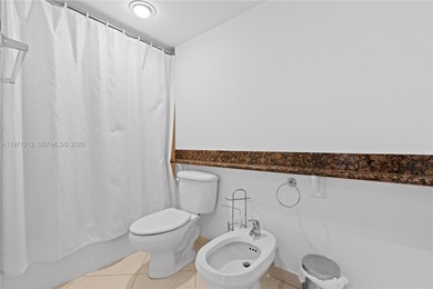 Enjoy Miami Beach living in this move-in ready two-bedroom