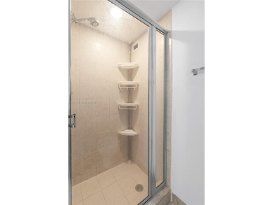 Enjoy Miami Beach living in this move-in ready two-bedroom