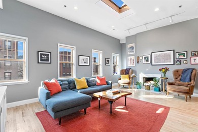Stunning, sunlit 1,320-square-foot penthouse featuring two - photo 1