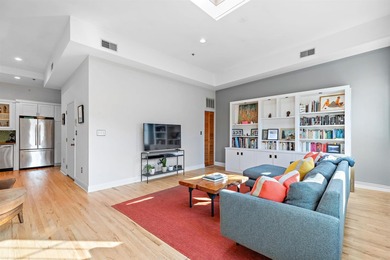 Stunning, sunlit 1,320-square-foot penthouse featuring two - photo 2