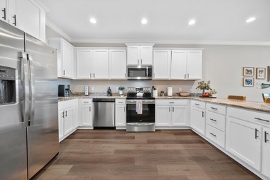 ~Turnkey. Waterfront. Income-ready.~ Built in 2020, this - photo 8