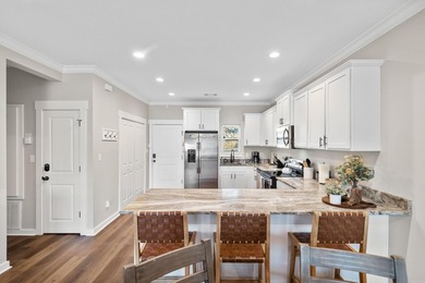 ~Turnkey. Waterfront. Income-ready.~ Built in 2020, this - photo 9
