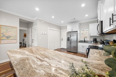 ~Turnkey. Waterfront. Income-ready.~ Built in 2020, this - photo 10